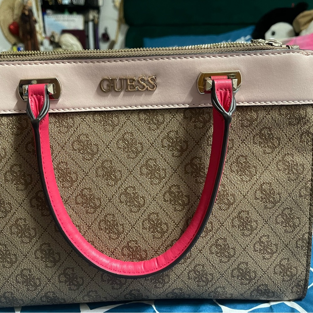 A Guess Bag and it still looks new I was only using it for a couple times.